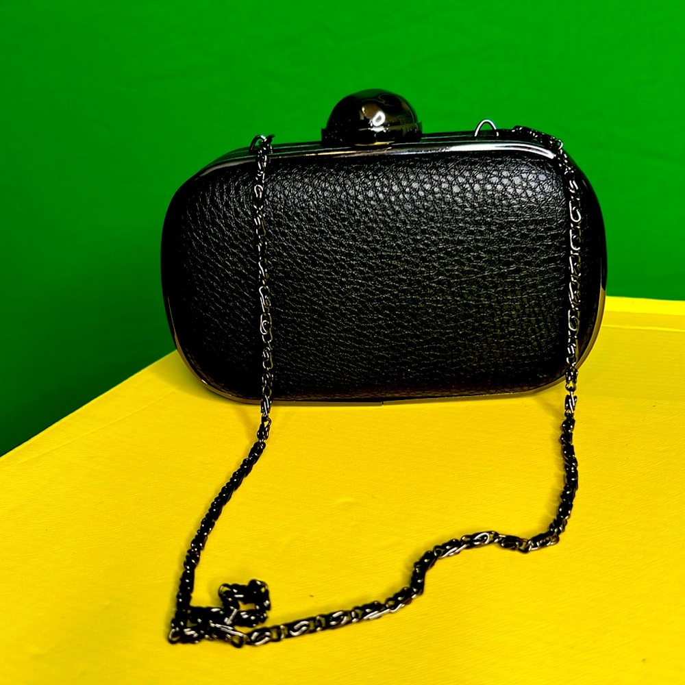 LULU TOWENSEND clutch purse with chain strap. Man made material. Snap shut.